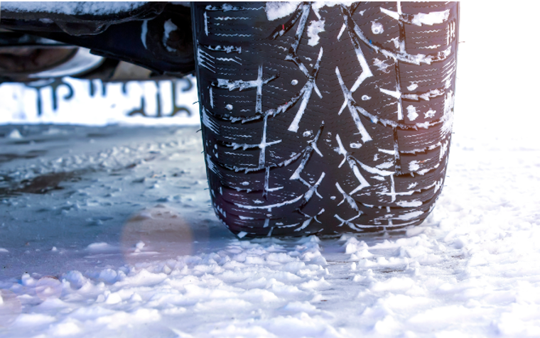 Chevrolet Silverado driving through snowy mountain roads in Oregon